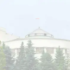 Budynek Sejmu RP, gdzie uchwalany jest akt prawny mający moc ustawy. W tle polska flaga.
